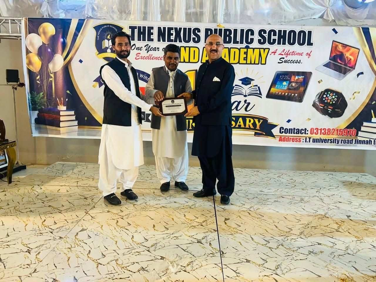 100 books and a laptop for The Nexus School and Academy