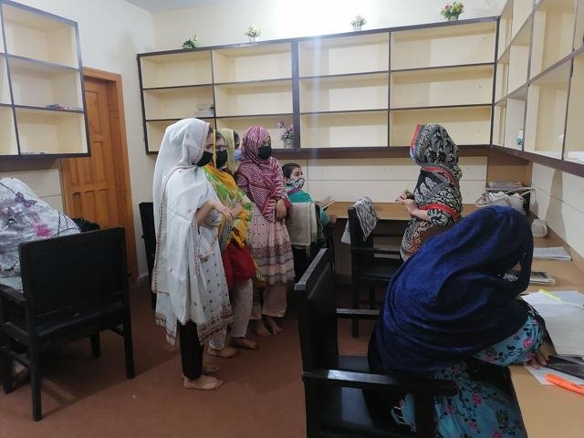 Female students settle in at a new library